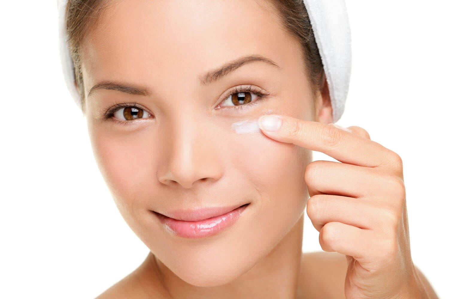 Crepey Eye Care Routine Woman applying eye care products for crepey skin around the eyes