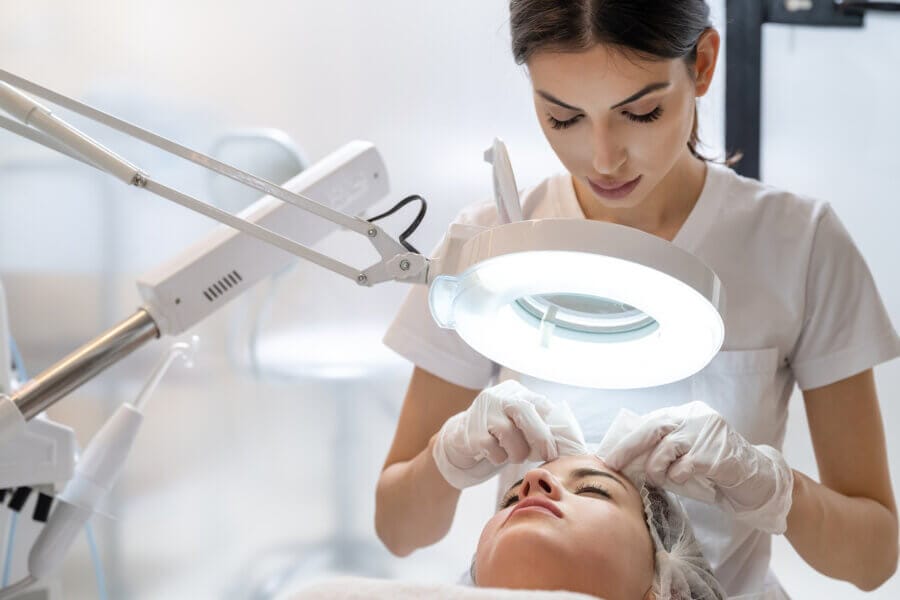 Esthetician performing a results-driven facial treatment at Personalized Skin Care in Fullerton CA