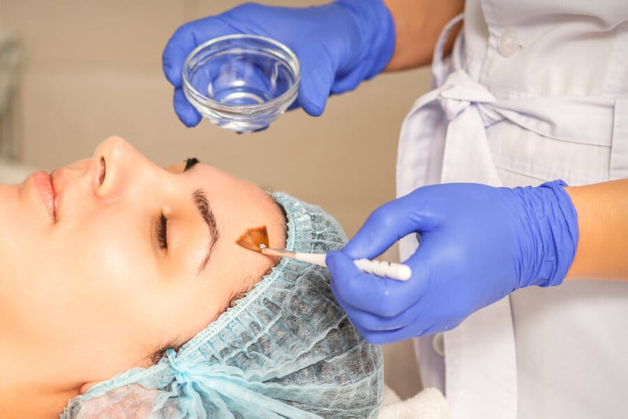 women enjoying facial treatment together in Fullerton spa for glowing skin and relaxation
