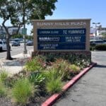 Sunny Hills Plaza sign in Fullerton, California near PSC Personalized Skin Care and Skin & Body Care Clinic.