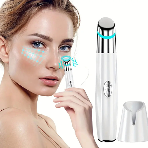 Heated eye massager